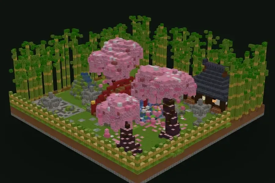 Japanischer Garten in Minecraft mit roter Bogenbrücke über einem Teich und blühenden Kirschbäumen